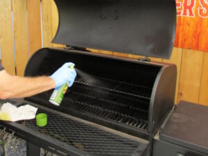 reapplying oil to the cooled-down Tahoma 900 smoker