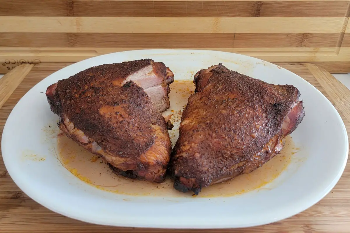 Weber Smokey Mountain Cooker with smoked turkey thighs